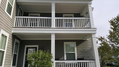 Sage front porch and balcony