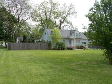 Large front lawn provides setback from the street