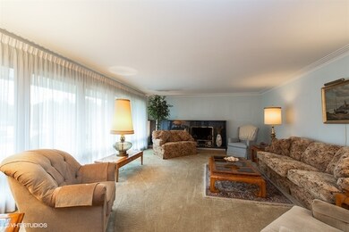 Spacious living room with plaster cove and one of 