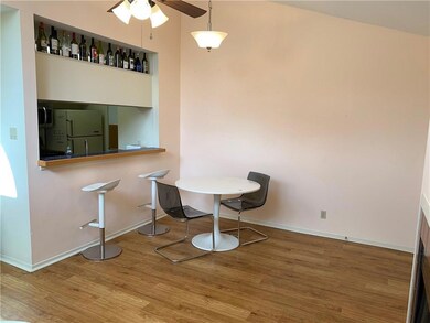 Dining area with wood finished floors and ceiling