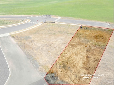 Aerial view of property and surrounding area with property boundaries highlighted
