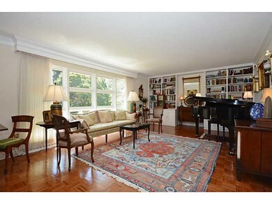 Living Room. Spacious with Crown Moulding & Custom