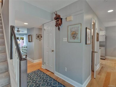 Foyer. Unit has stunning wide plank wood flooring 