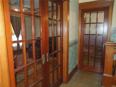 All original woodwork including the french doors i