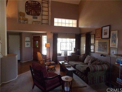Formal living Room and entry with soaring ceilings