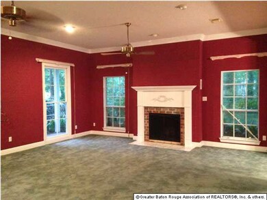 Den with real wood fireplace