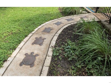 The custom sidewalk leads you to right to the in g