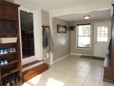 Large foyer with two beautiful new built ins for s