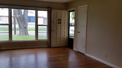 Beautiful picture window plus coat closet right ne