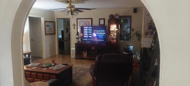 Living room featuring hardwood / wood-style floors