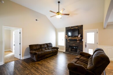 Beautiful stone fireplace in living room.