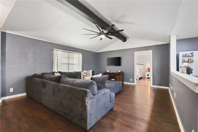 Living room featuring wood finished floors and a c