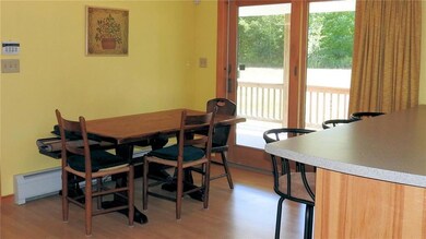Eat in Kitchen with door to a large...