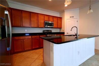 Kitchen featuring appliances with stainless steel