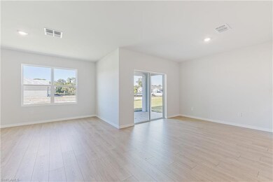 10315 Blooming Blossom Ct, Tice, FL 33905 - photo 3