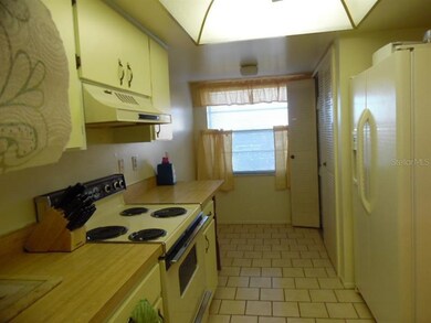 Eating space at end of Kitchen and utility closet 