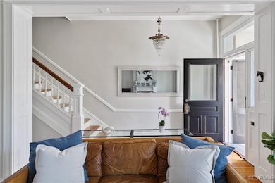 Living room with hardwood / wood-style flooring