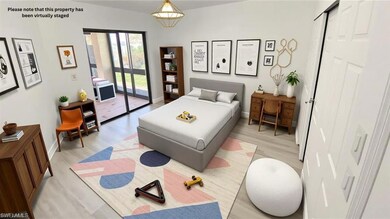 Bedroom with access to exterior, light wood-style flooring, and baseboards