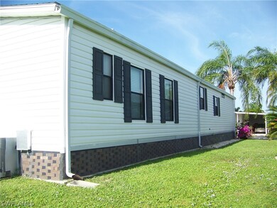 Side of home shows screened skirting($1000), downs