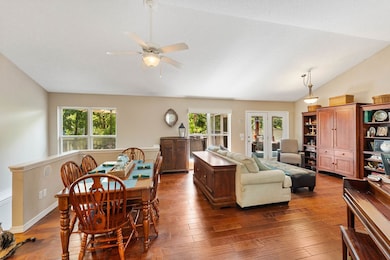 Open floor plan with views of the lake at every an