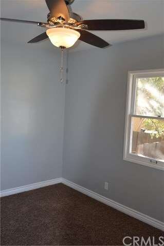 Each bedroom features a new ceiling fan, new carpe