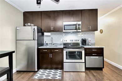 Kitchen with updated cabinets and stainless appliances