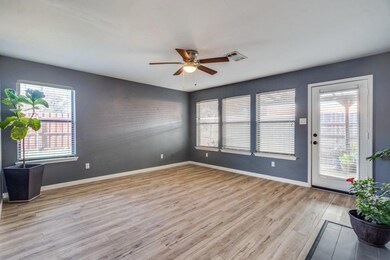 Unfurnished living room featuring light hardwood /