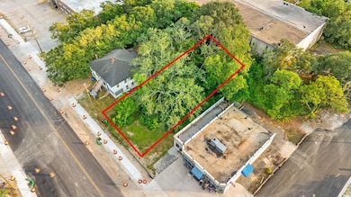 Aerial overview of property's location with property parcel outlined