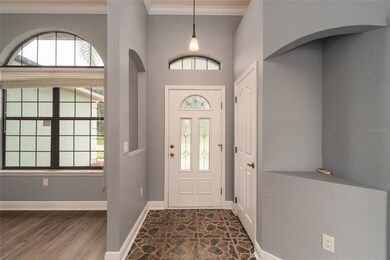 Front door with dining room to the left