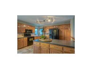 Beautiful Kitchen with Large Island and Decorative