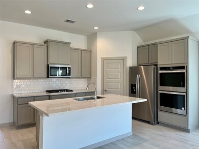 Kitchen with island, ss appliances
