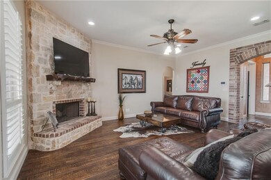 Family Room with hand scraped wood floors and ston