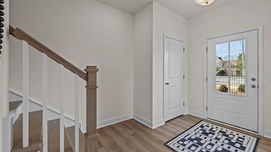Welcoming entrance foyer with coat closet, elevated ceiling, and premium finishes by DRB Homes Charlotte, NC