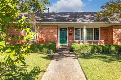 Single story home featuring a front lawn and cover
