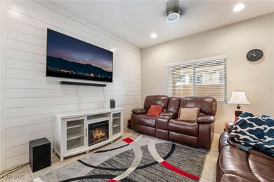 Living area with wood walls, light tile patterned