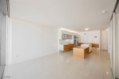 Kitchen with a kitchen island, light countertops,