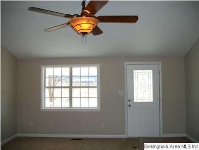 Kitchen with freshly painted cabinets, new hardwar