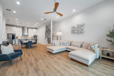 Living area featuring light wood-type flooring, s