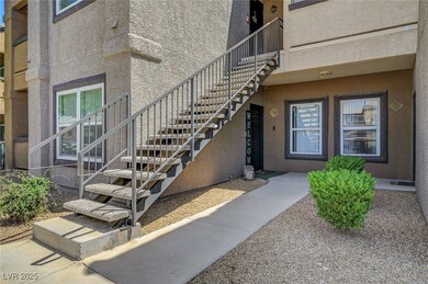 View of exterior entry with stucco siding