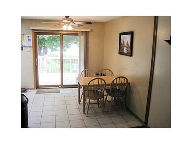 Dining Area. Neutral colors, ceramic tile floors, 