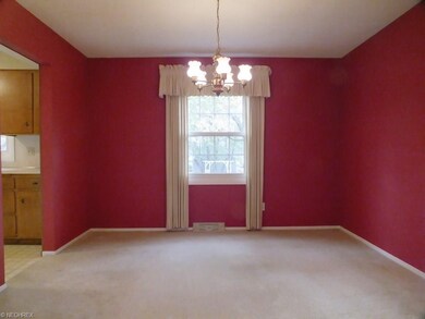 The lovely Dining Room has a nice view of the beau
