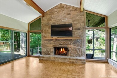 Great family room w/ parquet floors; cathedral cei