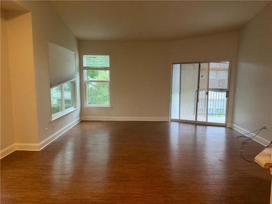 Living area-3 large windows for lots of natural li