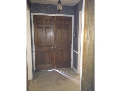 Front hallway and double doors