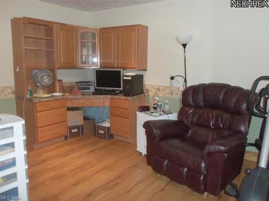 Formal dining room or office area with new laminat