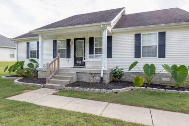 Enjoy your Front covered Porch ! 