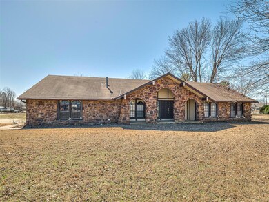 View of front of property featuring a shingled roo