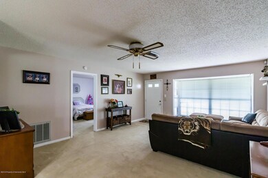 Living Room with  Bedroom Door