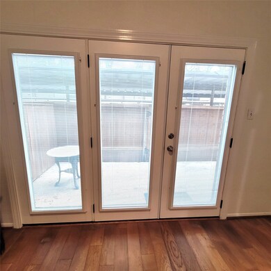 French doors from the dining room open onto the la