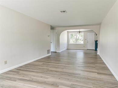Unfurnished living room featuring light hardwood / wood-style flooring